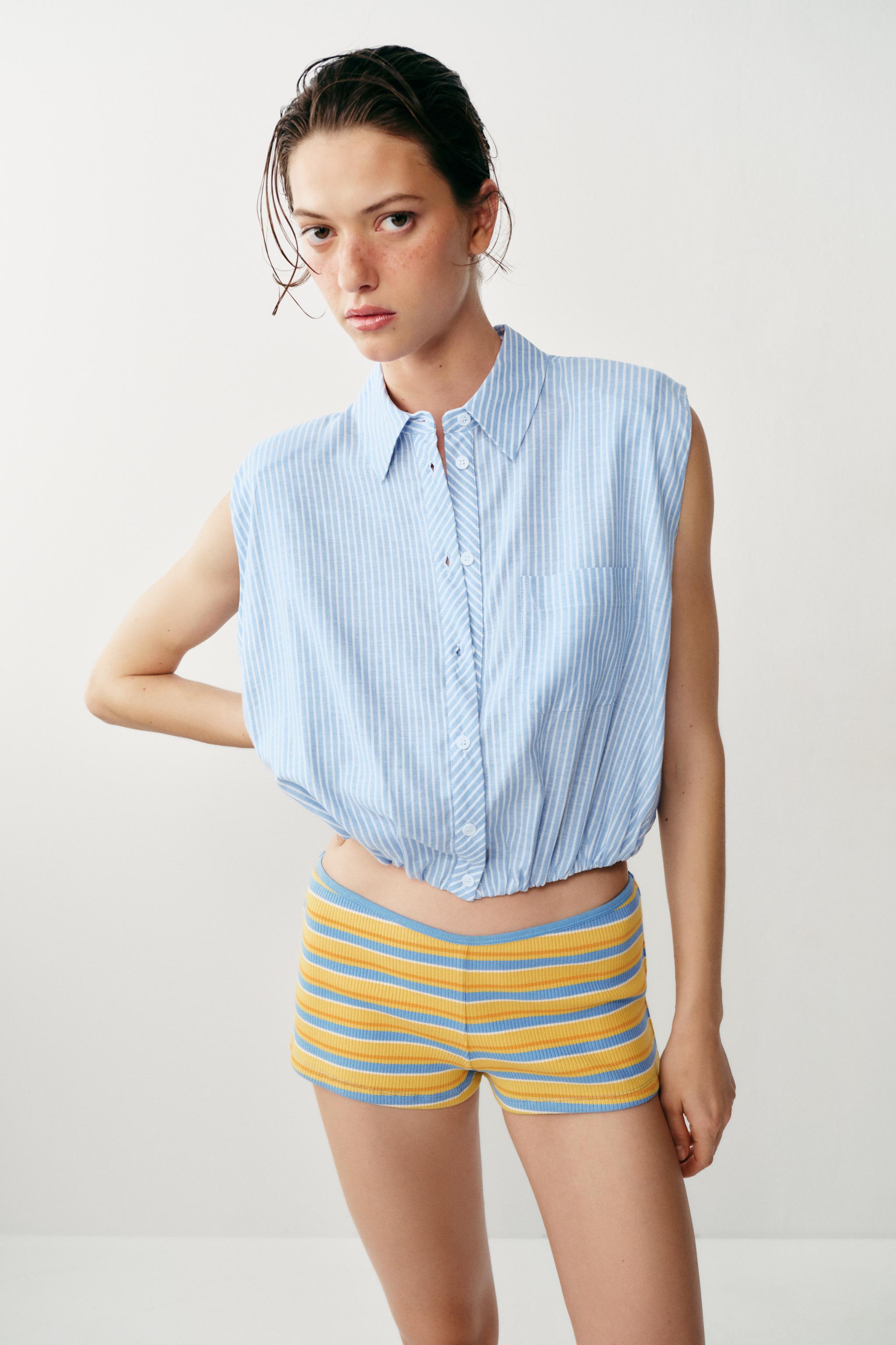 SHORT STRIPED SHOULDER PAD SHIRT